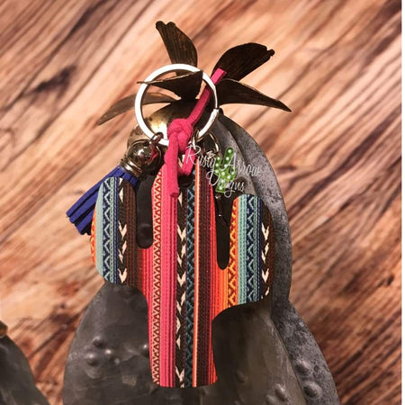 Leather background w/ Thunderbird Livestock Ear Tag Key chain