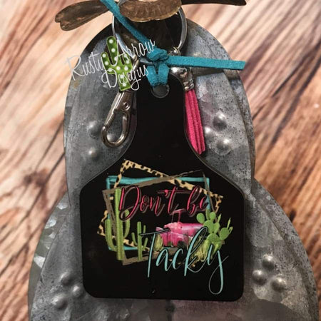 Turquoise Boots and Cheetah  Livestock Ear Tag Key Chain